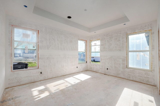 LOT69 W Marty St, Springfield, MO 65810 - unfurnished room with a tray ceiling and plenty of natural light