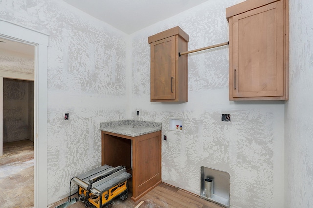 LOT69 W Marty St, Springfield, MO 65810 - laundry room with cabinet space, light wood-style flooring, and hookup for a washing machine