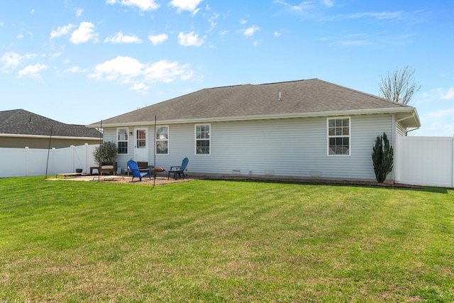 715 Woodlawn St, Marshfield, MO 65706 - rear view of house featuring a yard, a fenced backyard, a patio, and roof with shingles