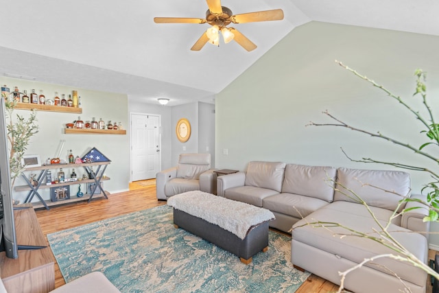 715 Woodlawn St, Marshfield, MO 65706 - living area featuring wood finished floors, baseboards, a ceiling fan, and vaulted ceiling