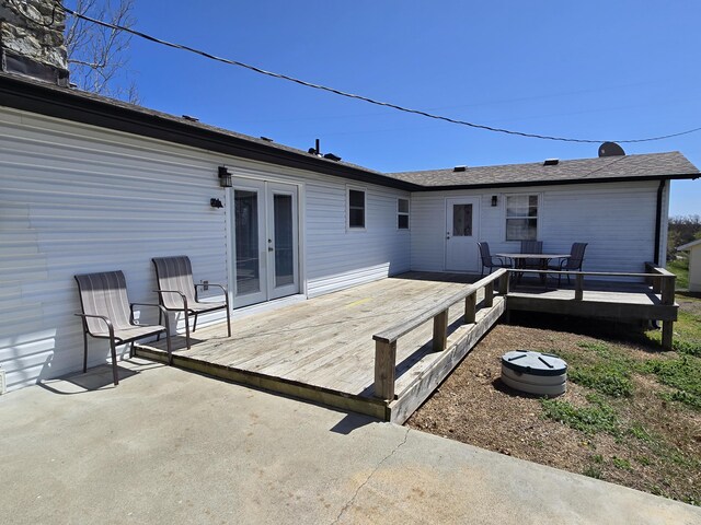 21282 County Road 295, Hermitage, MO 65668 - back of property featuring a deck and french doors