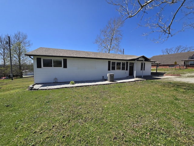 21282 County Road 295, Hermitage, MO 65668 - rear view of house with a lawn, a patio area, and cooling unit