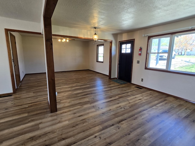 21282 County Road 295, Hermitage, MO 65668 - foyer featuring baseboards, a ceiling fan, wood finished floors, and a textured ceiling
