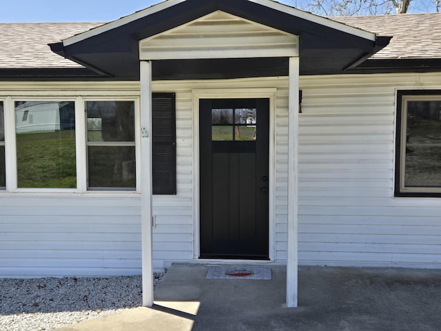 21282 County Road 295, Hermitage, MO 65668 - view of exterior entry with roof with shingles