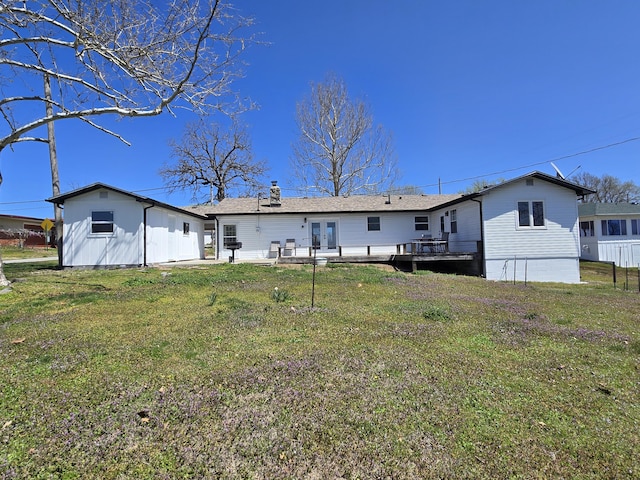 21282 County Road 295, Hermitage, MO 65668 - back of property featuring a lawn, french doors, and a deck