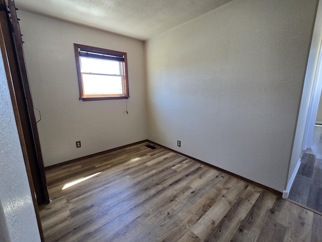 21282 County Road 295, Hermitage, MO 65668 - interior space with baseboards and wood finished floors