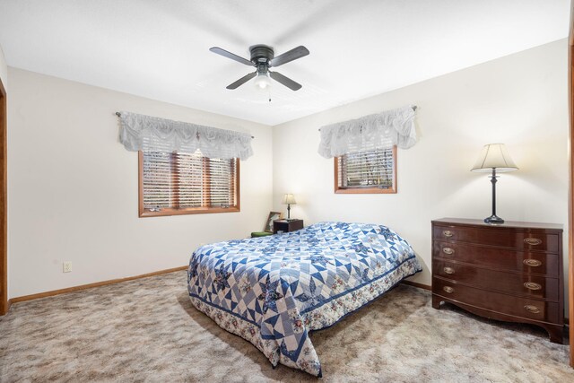 205 Forest Ln, Kimberling City, MO 65686 - carpeted bedroom featuring baseboards and a ceiling fan