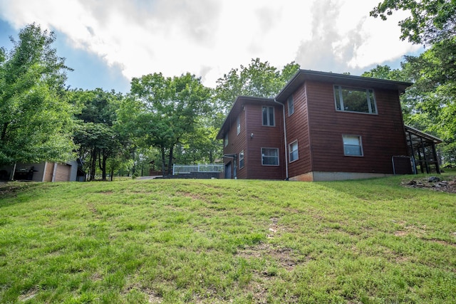 205 Forest Ln, Kimberling City, MO 65686 - view of side of home featuring a lawn
