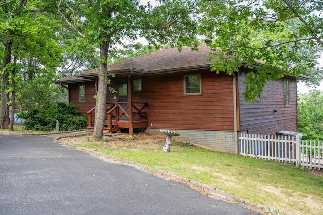 205 Forest Ln, Kimberling City, MO 65686 - view of front facade featuring roof with shingles