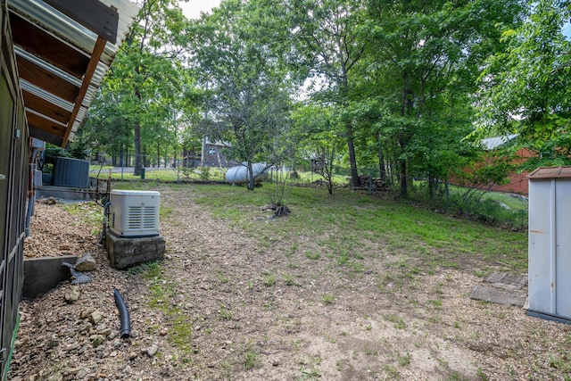 205 Forest Ln, Kimberling City, MO 65686 - fenced backyard featuring central AC