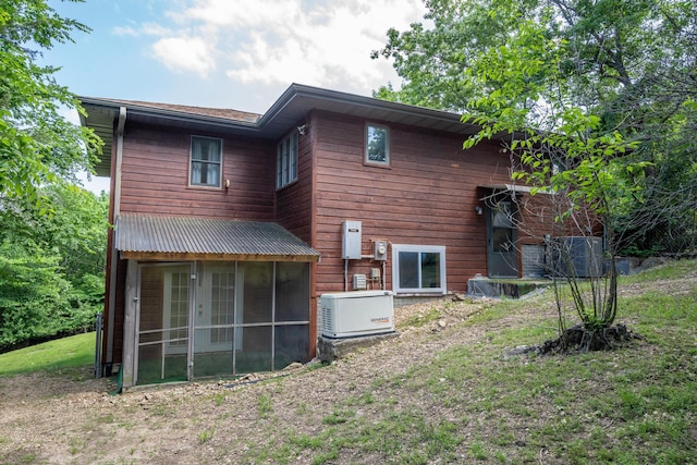 205 Forest Ln, Kimberling City, MO 65686 - back of house with a sunroom and cooling unit