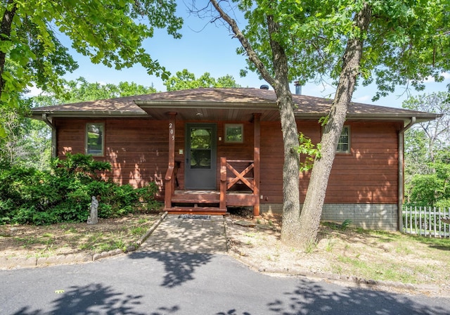 205 Forest Ln, Kimberling City, MO 65686 - view of front facade featuring covered porch