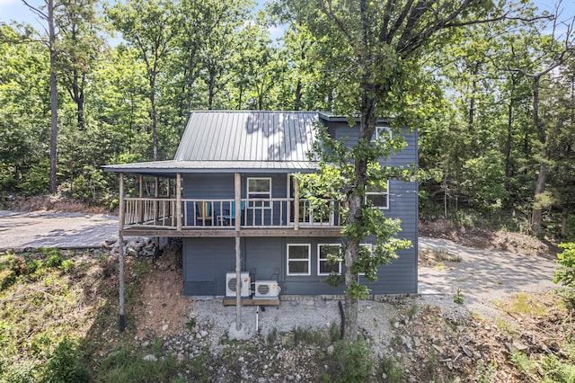 27857 Farm Rd Unit 1250, Golden, MO 65658 - back of house with a cooling unit, metal roof, and a balcony