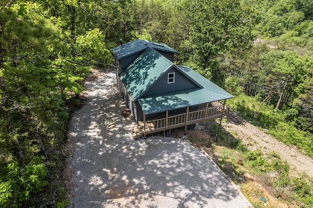 27857 Farm Rd Unit 1250, Golden, MO 65658 - exterior view of asphalt driveway, metal roof, and a view of trees