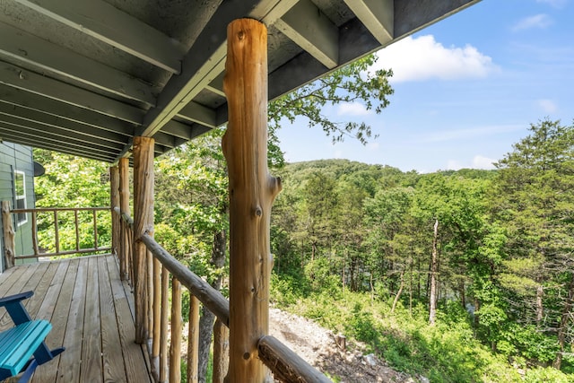 27857 Farm Rd Unit 1250, Golden, MO 65658 - wooden deck featuring a view of trees