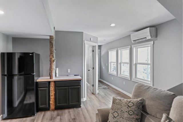 27857 Farm Rd Unit 1250, Golden, MO 65658 - living area with a wall mounted air conditioner, light wood-style flooring, baseboards, and recessed lighting