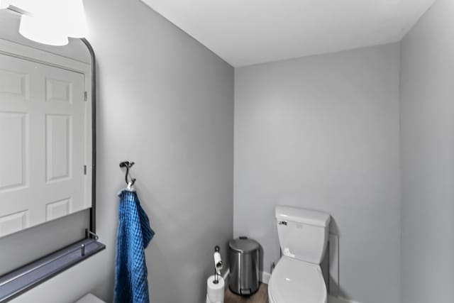 27857 Farm Rd Unit 1250, Golden, MO 65658 - half bathroom with toilet, wood finished floors, and baseboards