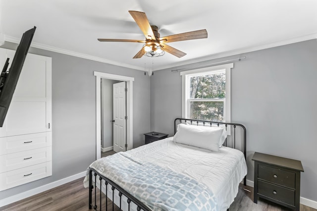 27857 Farm Rd Unit 1250, Golden, MO 65658 - bedroom featuring dark wood finished floors, baseboards, crown molding, and ceiling fan