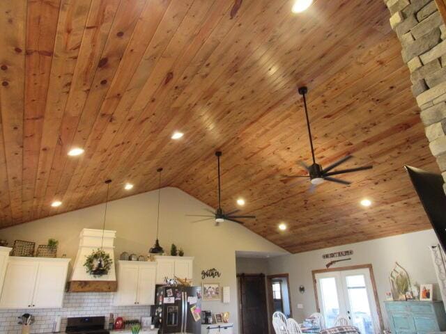 interior space with wooden ceiling, high vaulted ceiling, ceiling fan, and recessed lighting