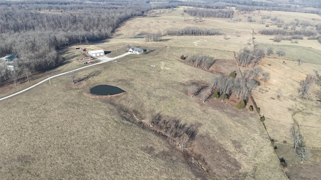 birds eye view of property featuring a rural view