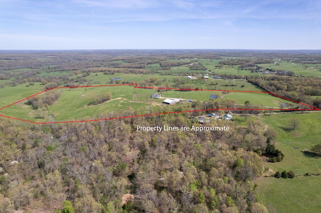 birds eye view of property featuring a rural view