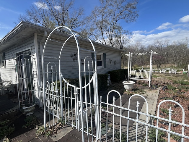 1131 Polk St, Warsaw, MO 65355 - view of side of home with fence