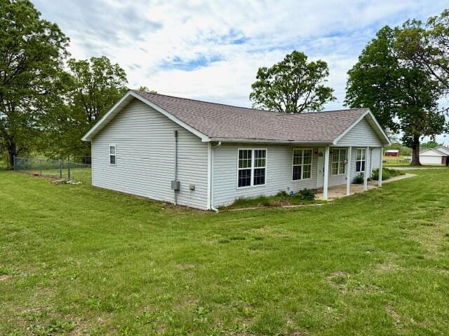 1005 County Road 3030, Mountain View, MO 65548 - rear view of property with a patio area and a shingled roof