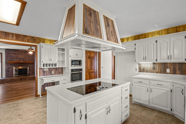 3131 E Southern Hills Blvd, Springfield, MO 65804 - kitchen featuring premium range hood, appliances with stainless steel finishes, open shelves, and white cabinets