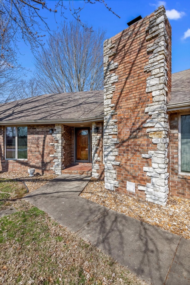 3131 E Southern Hills Blvd, Springfield, MO 65804 - exterior space featuring brick siding and roof with shingles