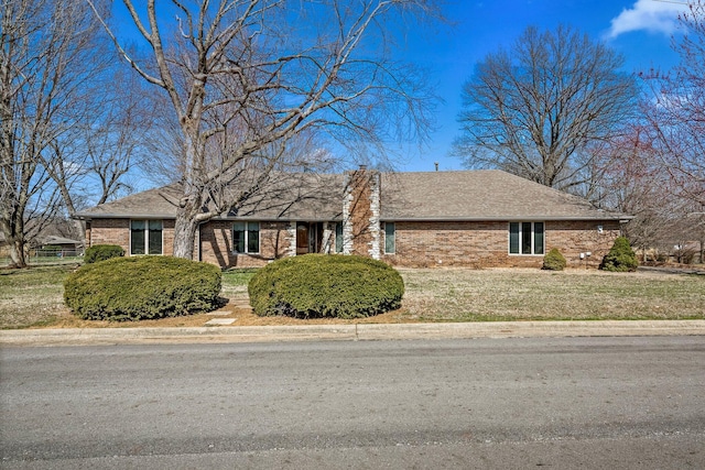 3131 E Southern Hills Blvd, Springfield, MO 65804 - single story home with roof with shingles, brick siding, and a front yard