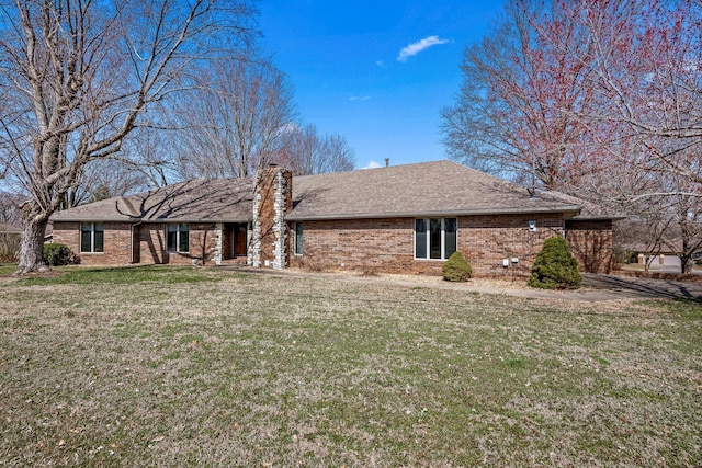 3131 E Southern Hills Blvd, Springfield, MO 65804 - ranch-style house featuring roof with shingles, a front yard, and brick siding