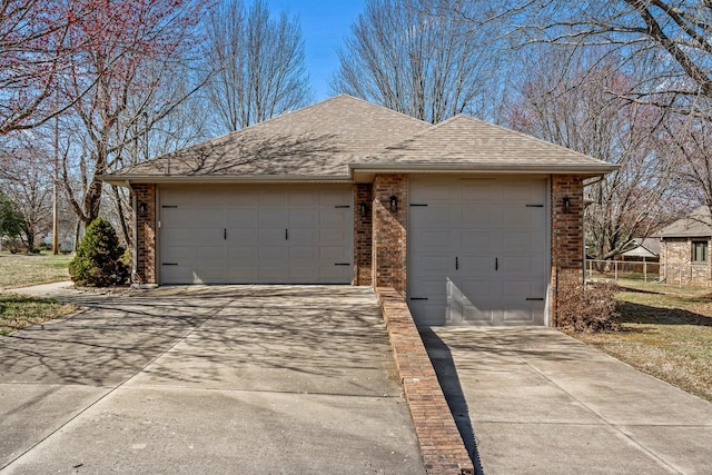 3131 E Southern Hills Blvd, Springfield, MO 65804 - garage with concrete driveway