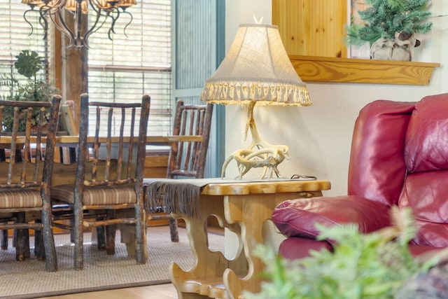 living area featuring a notable chandelier