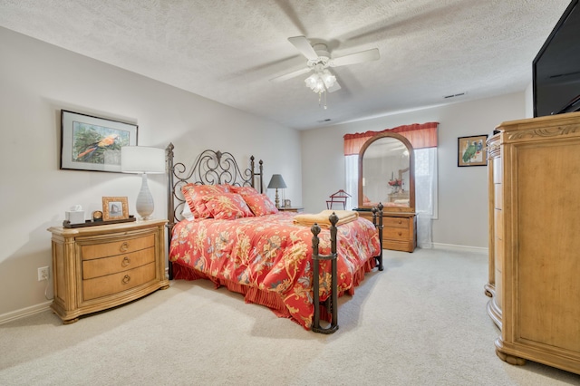 4040 E Windsong St, Springfield, MO 65809 - bedroom with a textured ceiling, light colored carpet, a ceiling fan, visible vents, and baseboards