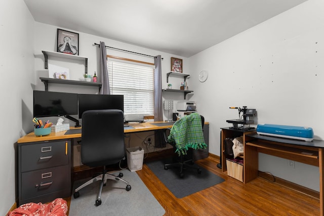 office space featuring wood finished floors