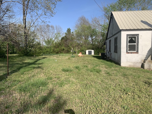 view of yard featuring central AC
