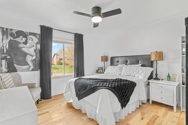 bedroom featuring light wood-style flooring and ceiling fan