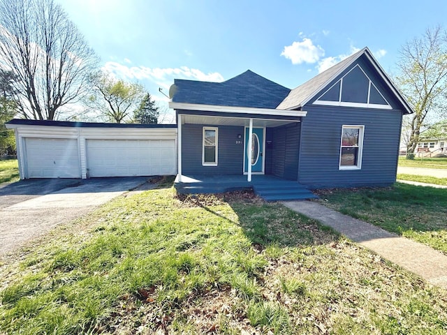 2151 N Weller Ave, Springfield, MO 65803 - view of front facade featuring a porch, a front lawn, and roof with shingles