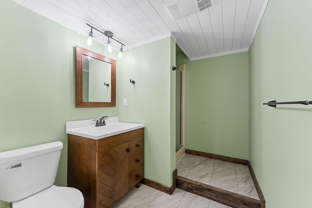 full bath with toilet, marble finish floor, ornamental molding, and vanity