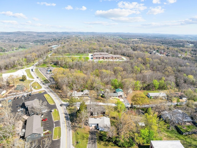 bird's eye view featuring a forest view
