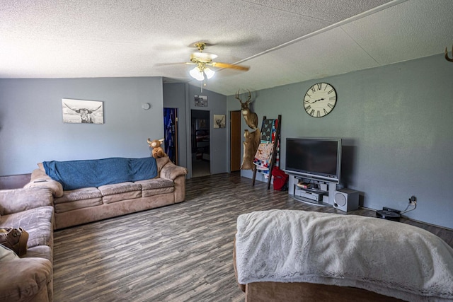 15601 County Road 281, Wheatland, MO 65779 - living room with a textured ceiling, vaulted ceiling, a ceiling fan, and wood finished floors