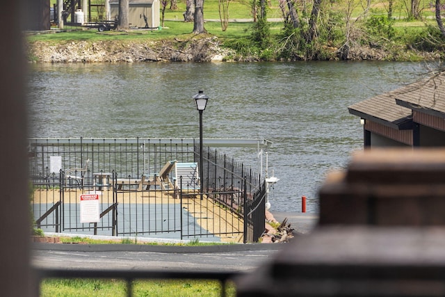 dock area with a water view