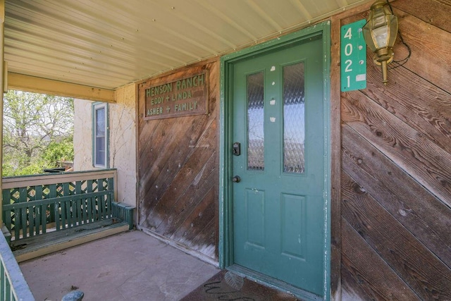 entrance to property with a porch