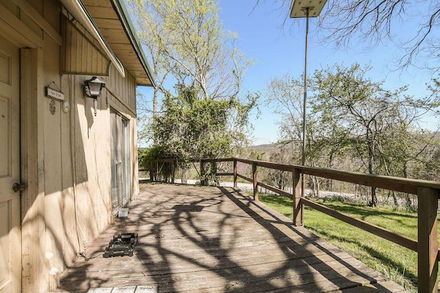 deck featuring a yard