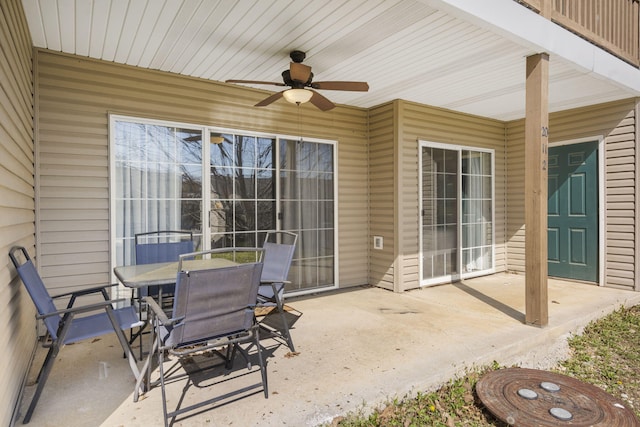 610 Abby Ln Unit 2, Branson, MO 65616 - view of patio featuring ceiling fan and outdoor dining space