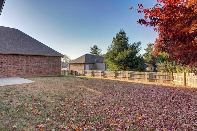 view of yard with fence