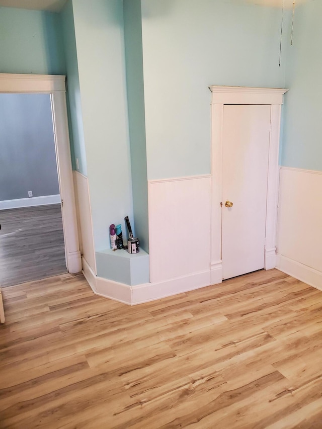 2111 N Grant Ave, Springfield, MO 65803 - empty room featuring wood finished floors and wainscoting