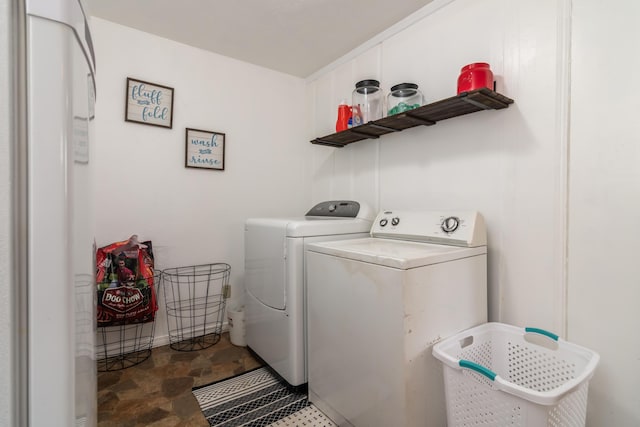 317 W 1st St, Miller, MO 65707 - clothes washing area featuring washer and dryer and laundry area