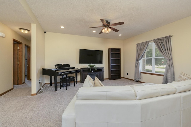 1431 Isdell St, Bolivar, MO 65613 - living area with light colored carpet, ceiling fan, a textured ceiling, baseboards, and recessed lighting