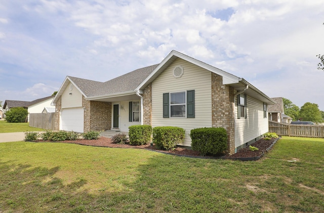 1431 Isdell St, Bolivar, MO 65613 - single story home featuring an attached garage, brick siding, and concrete driveway